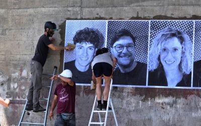 65 portraits sur un mur de la Base sous-marine